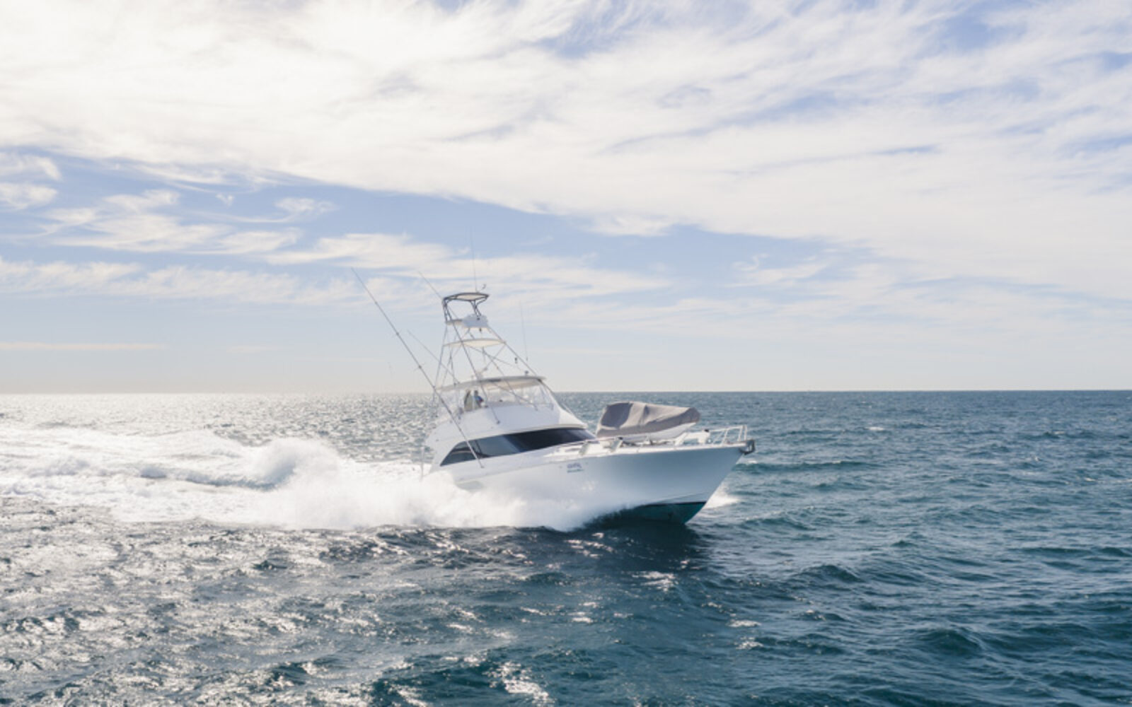 A Viking sportfish underway offshore, shot for a brokerage listing